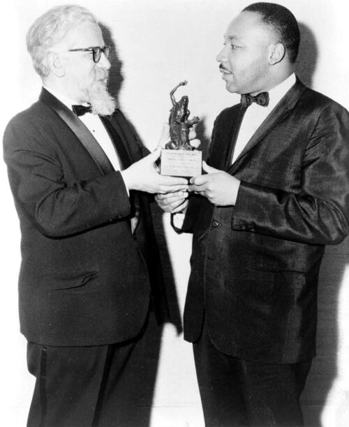 Rabbi Abraham Joshua Heschel, left, presents the Judaism and World Peace award to the Rev. Martin Luther King Jr. on Dec. 7, 1965. Photo courtesy of LOC/Creative Commons